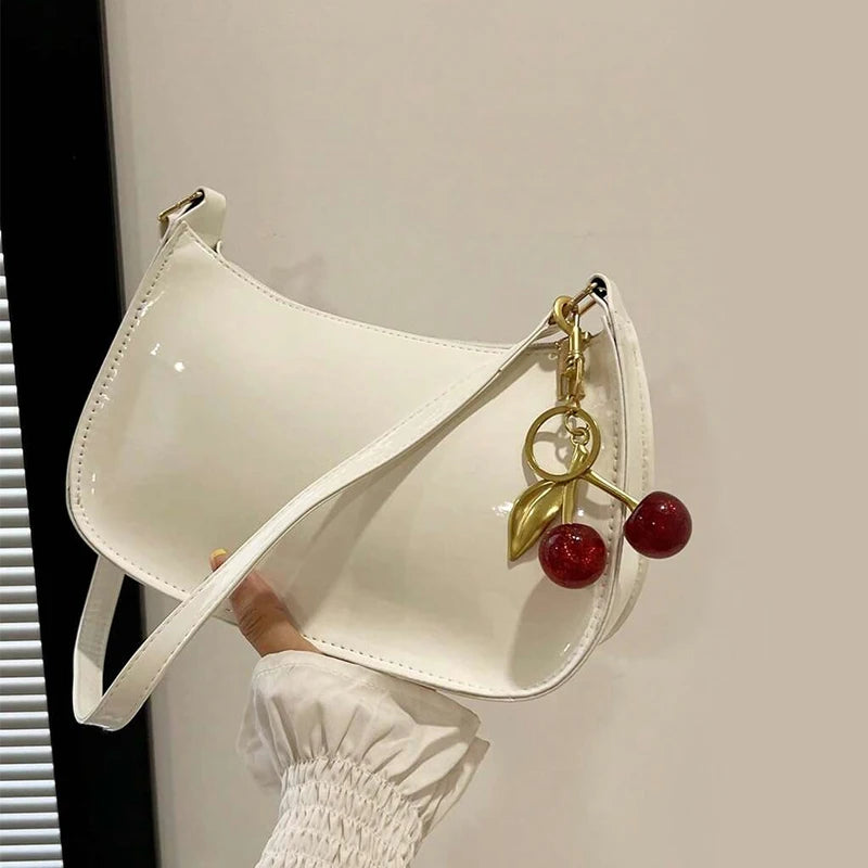 Women's PU Leather Handbag Versatile Fashion Solid Color Cherry Pendant Shoulder Bag Casual Commuting Bag Girl Underarm Bag