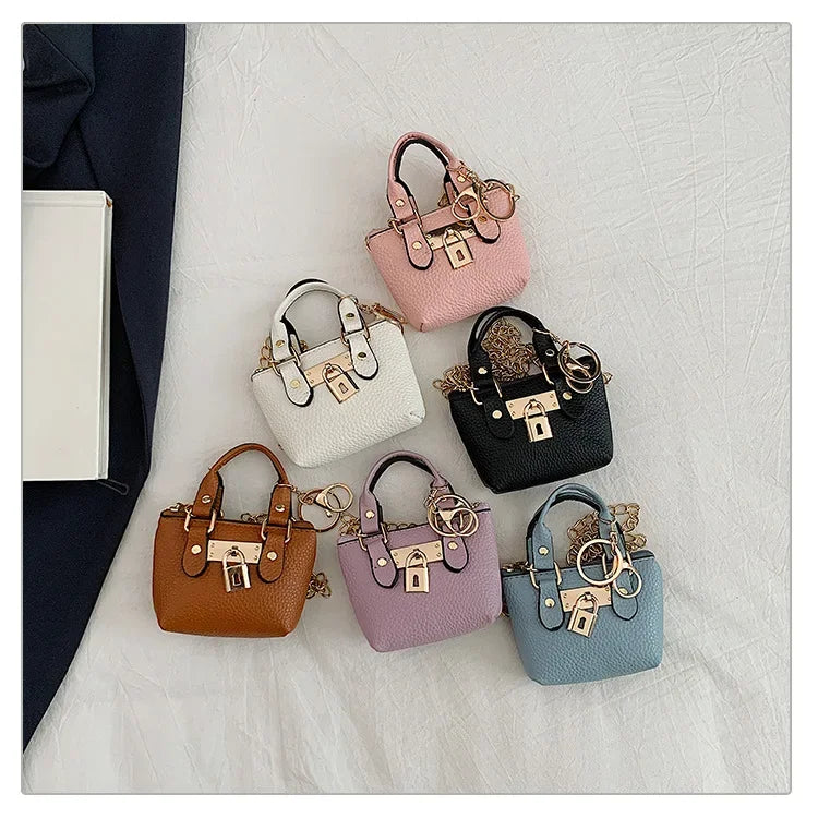 2026 Girls Hand-held Small Square Bag 2025 Summer New Classic Children Carrying One-shoulder Messenger Bag. Wallet Keychain