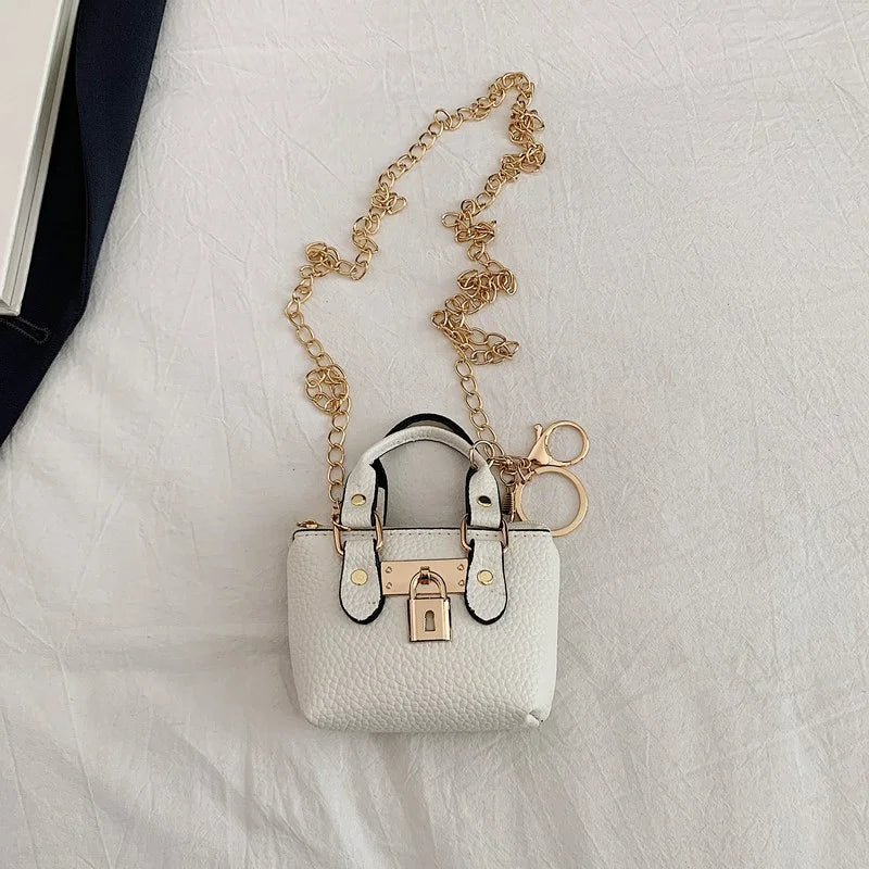 2026 Girls Hand-held Small Square Bag 2025 Summer New Classic Children Carrying One-shoulder Messenger Bag. Wallet Keychain