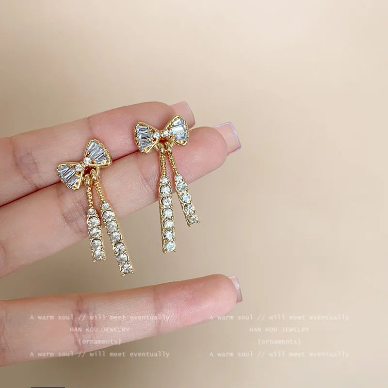 Gold Bow Stud Earrings with Rhinestone Dangle