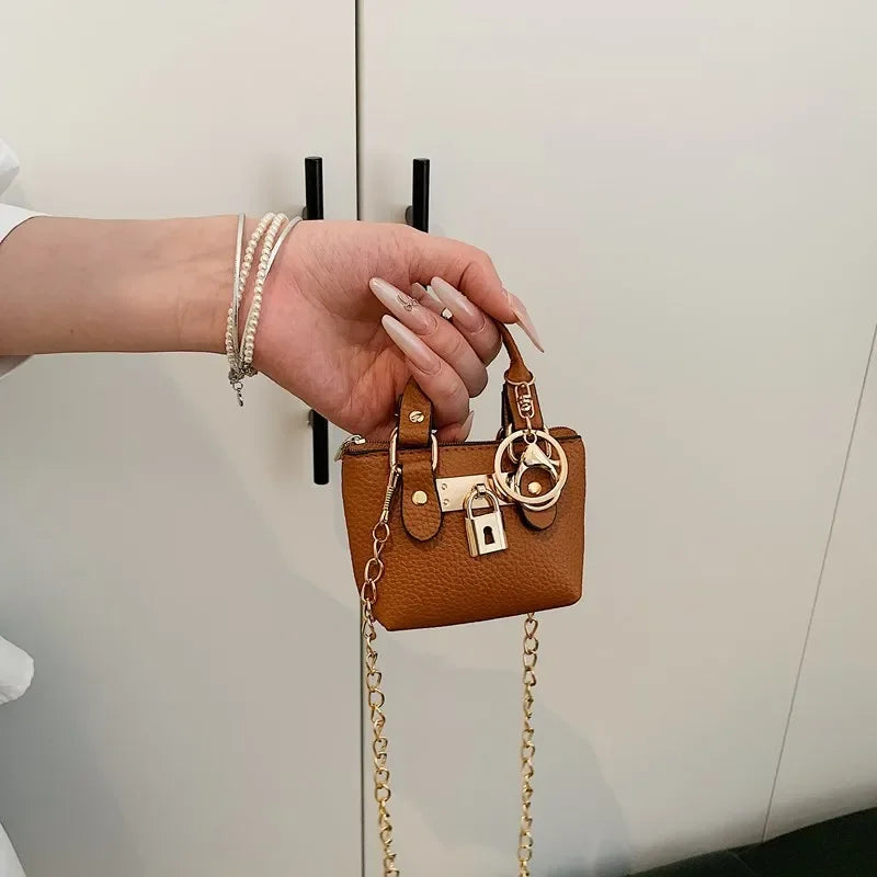 2026 Girls Hand-held Small Square Bag 2025 Summer New Classic Children Carrying One-shoulder Messenger Bag. Wallet Keychain