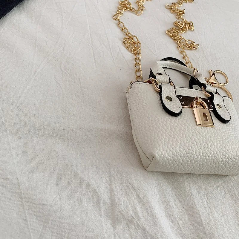2026 Girls Hand-held Small Square Bag 2025 Summer New Classic Children Carrying One-shoulder Messenger Bag. Wallet Keychain