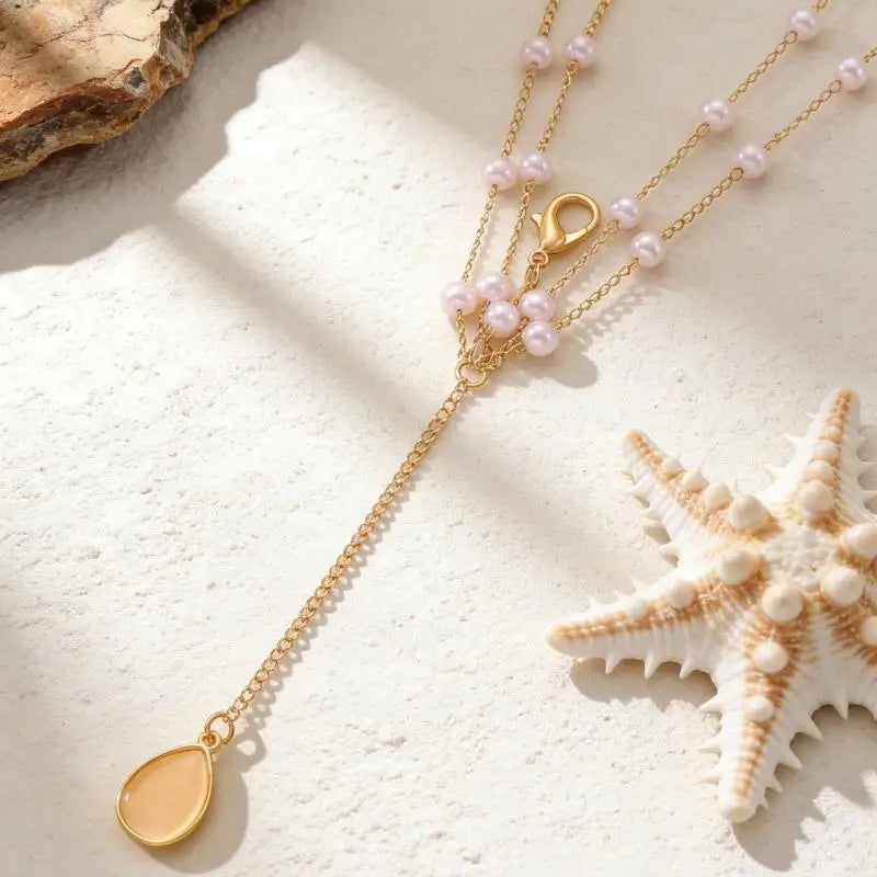 Boho Layered Pearl Waist Chain – Gold Body Jewelry