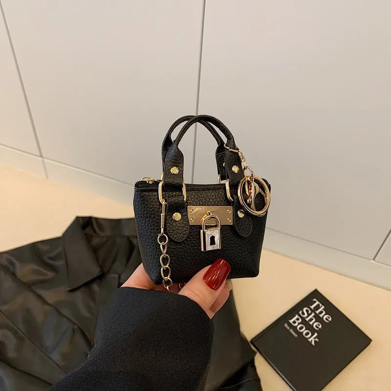 2026 Girls Hand-held Small Square Bag 2025 Summer New Classic Children Carrying One-shoulder Messenger Bag. Wallet Keychain
