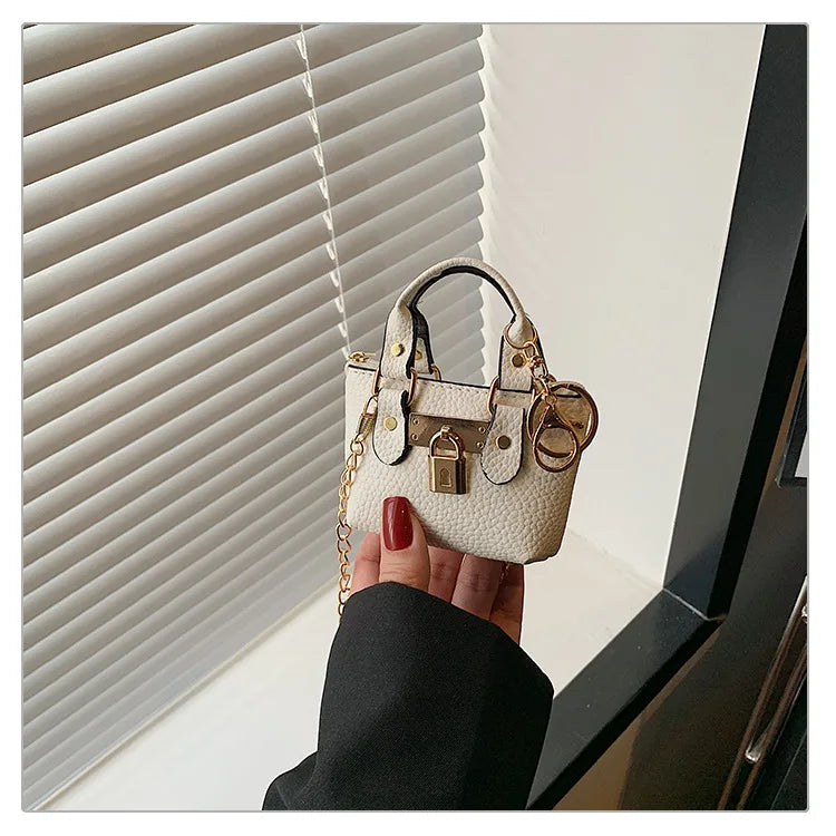 2026 Girls Hand-held Small Square Bag 2025 Summer New Classic Children Carrying One-shoulder Messenger Bag. Wallet Keychain