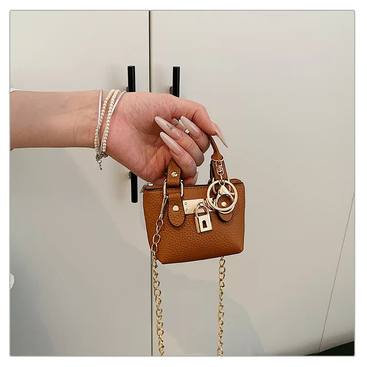 2026 Girls Hand-held Small Square Bag 2025 Summer New Classic Children Carrying One-shoulder Messenger Bag. Wallet Keychain