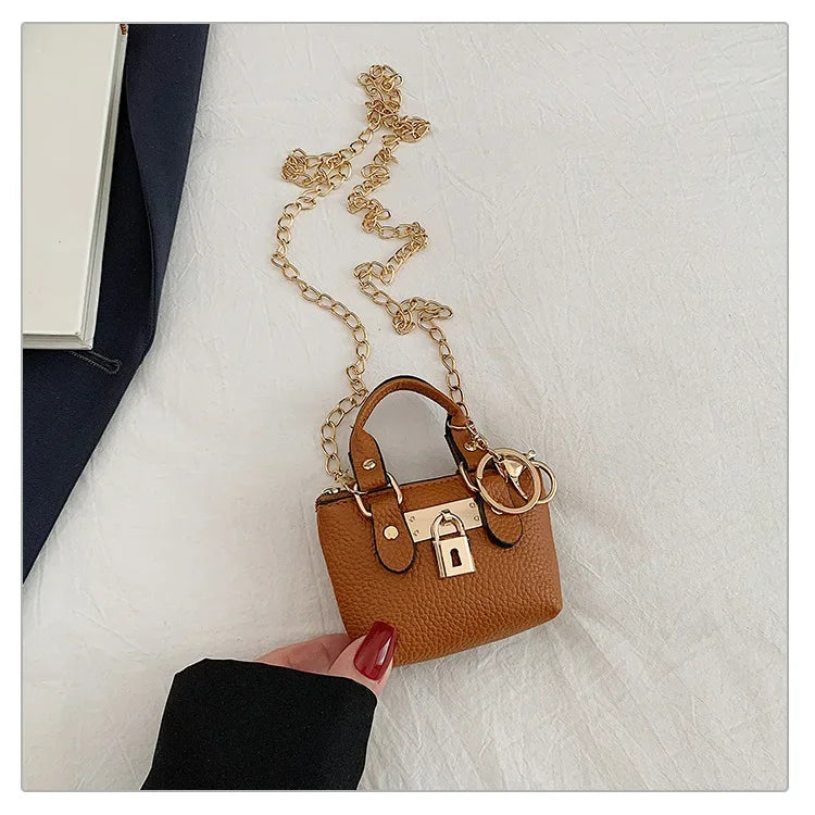 2026 Girls Hand-held Small Square Bag 2025 Summer New Classic Children Carrying One-shoulder Messenger Bag. Wallet Keychain