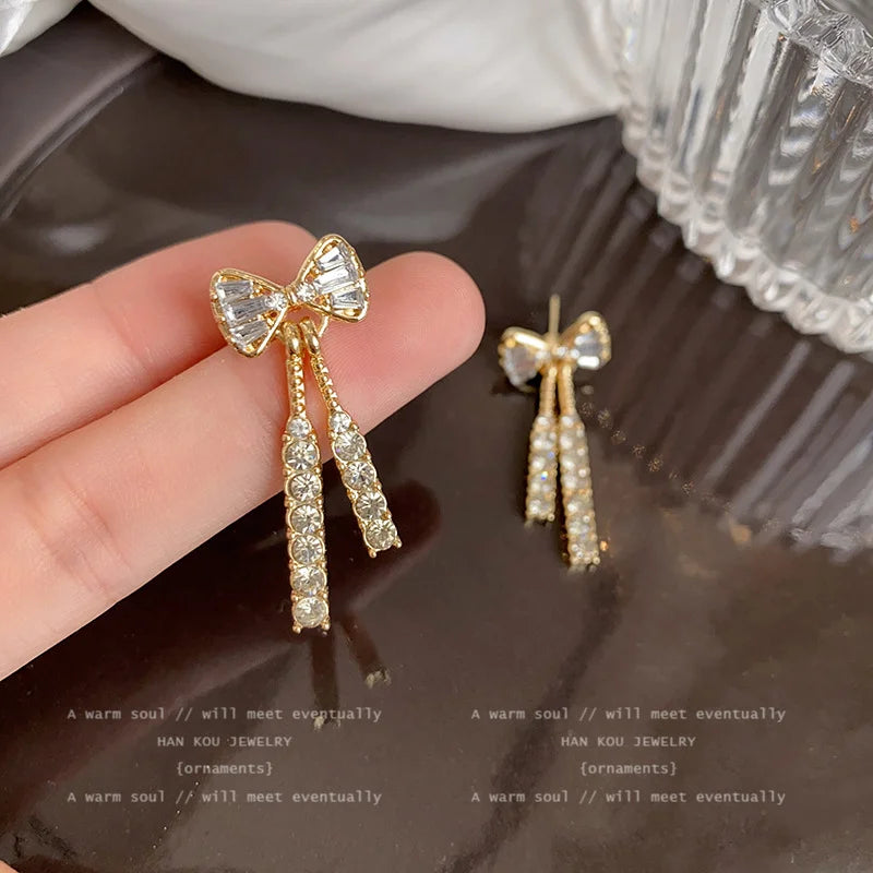 Gold Bow Stud Earrings with Rhinestone Dangle